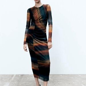 Zara Dress 
round Neck, midi Dress long sleeve.
Sand blue printed tulle